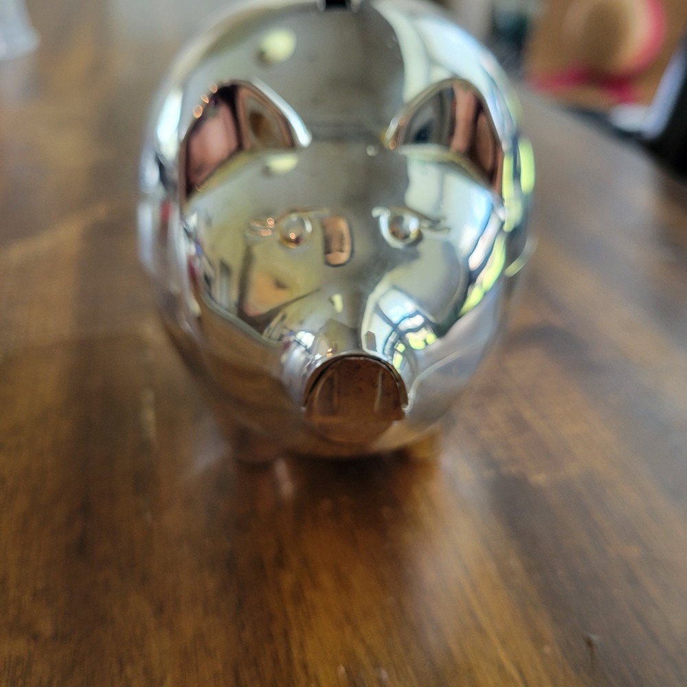 pre-loved small metal piggy bank with stopper excellent condition